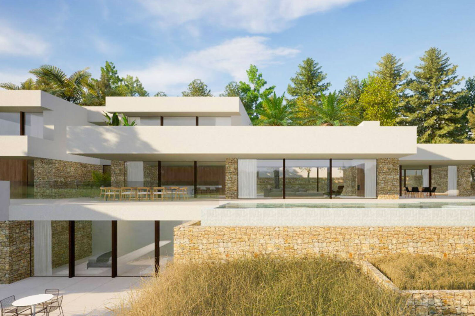 Fachada moderna de tres niveles con muros de piedra natural, amplios ventanales de suelo a techo y una piscina desbordante integrada en la terraza principal.