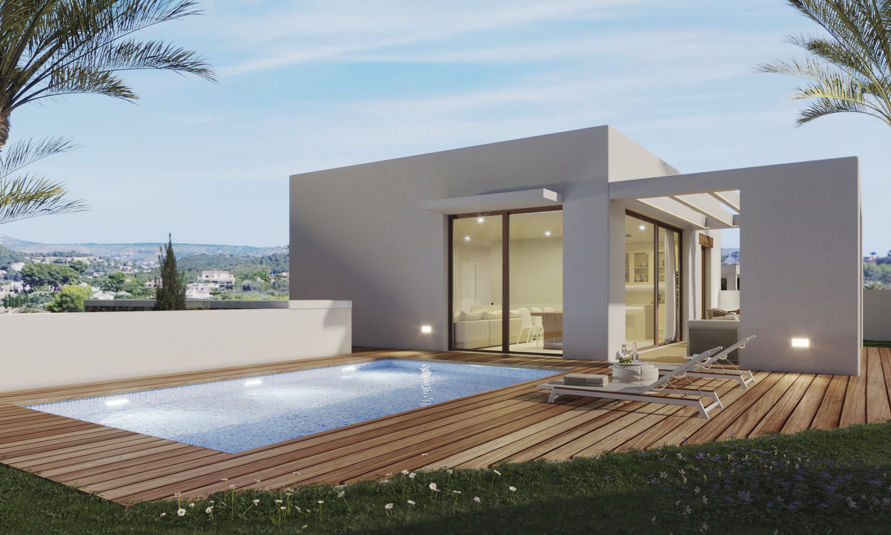 Exterior de la villa con piscina de mosaico azul, amplia terraza de madera y grandes ventanales que integran el salón con el jardín y las vistas al paisaje.