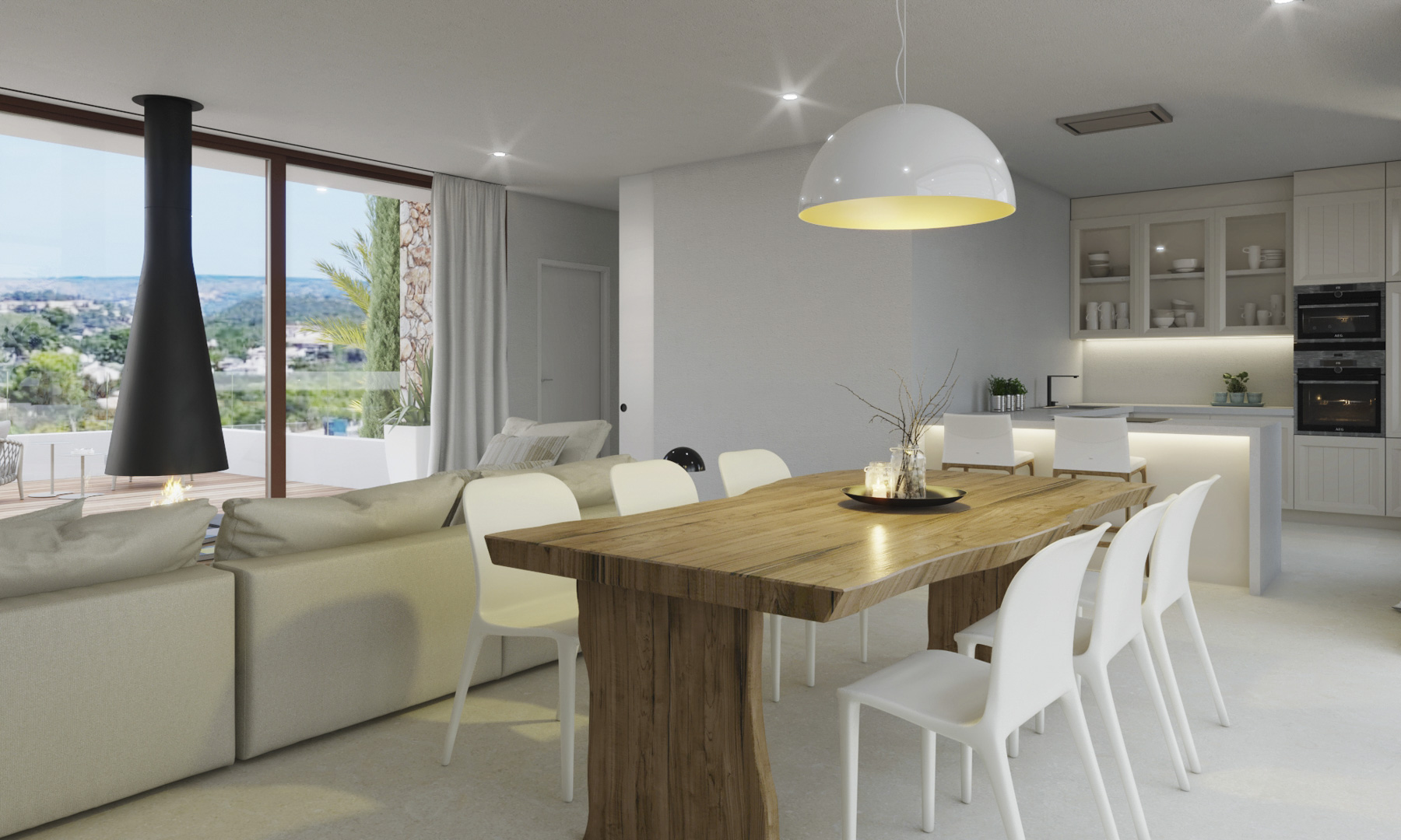 Salón-comedor de planta abierta con mesa de madera maciza, chimenea suspendida de diseño y cocina integrada con vistas al paisaje y abundante luz natural.