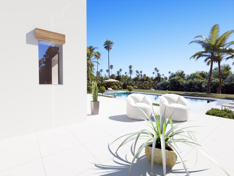 Terraza exterior con pavimento blanco, zona de estar con sillones modernos junto a la piscina y jardín mediterráneo con palmeras bajo un cielo despejado.