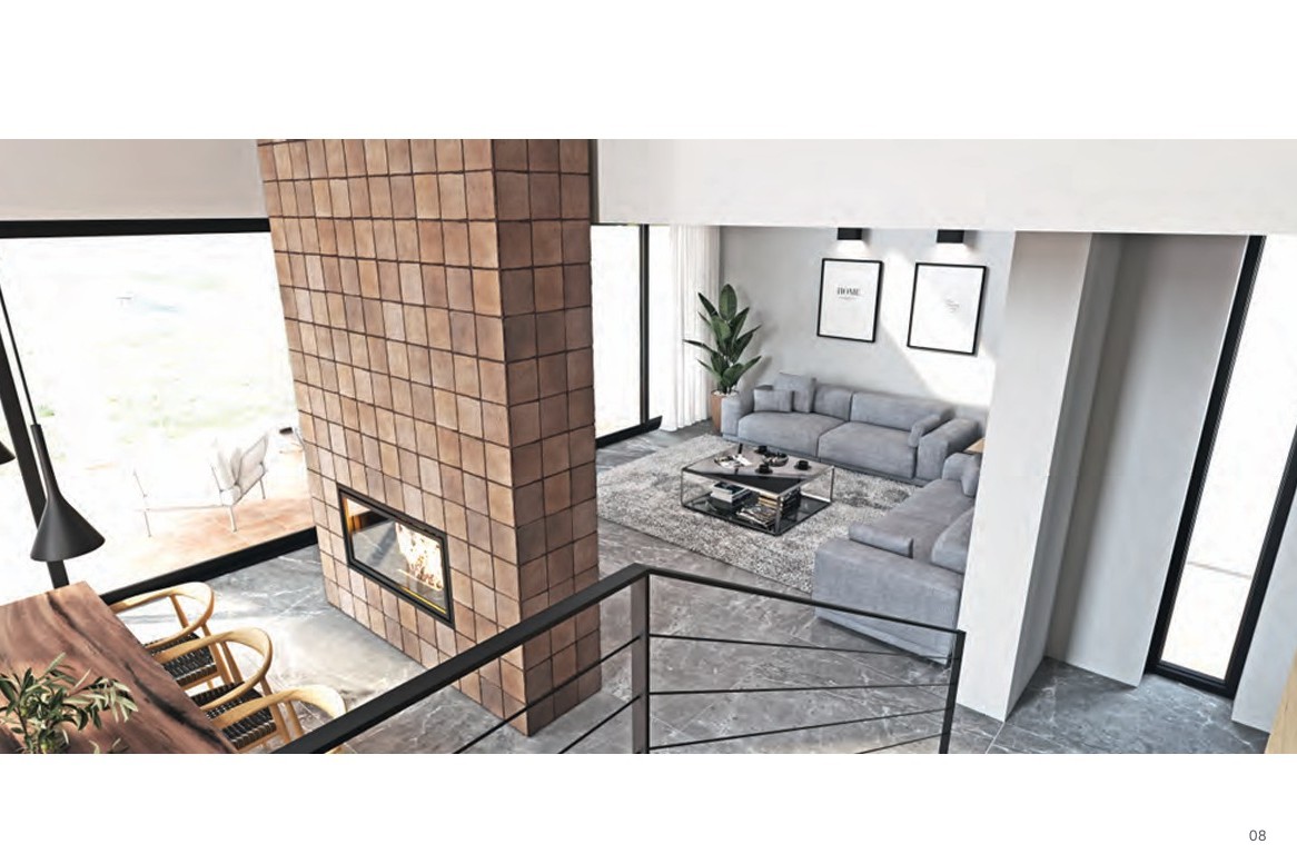 Vista desde la planta superior del salón con chimenea central revestida en terracota, suelos de mármol gris y amplios ventanales que integran el exterior.