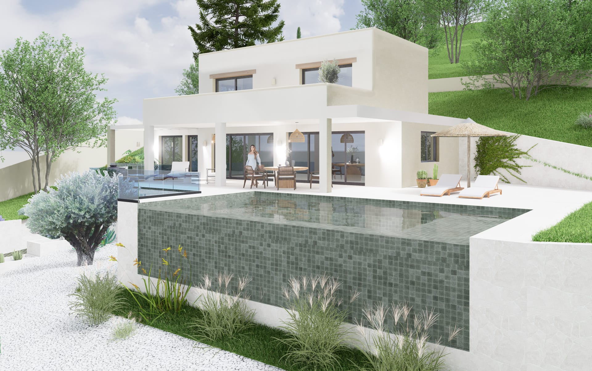 Vista exterior de la villa con piscina infinita de mosaico verde y terraza blanca. La fachada minimalista incluye un porche cubierto integrado en el entorno natural de Rafalet.