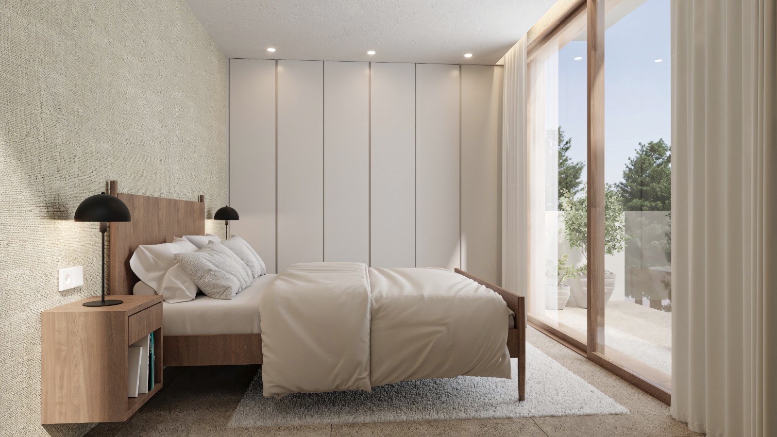 Dormitorio moderno con armarios empotrados de suelo a techo, pared texturizada y grandes ventanales correderos que dan acceso directo a una terraza privada.