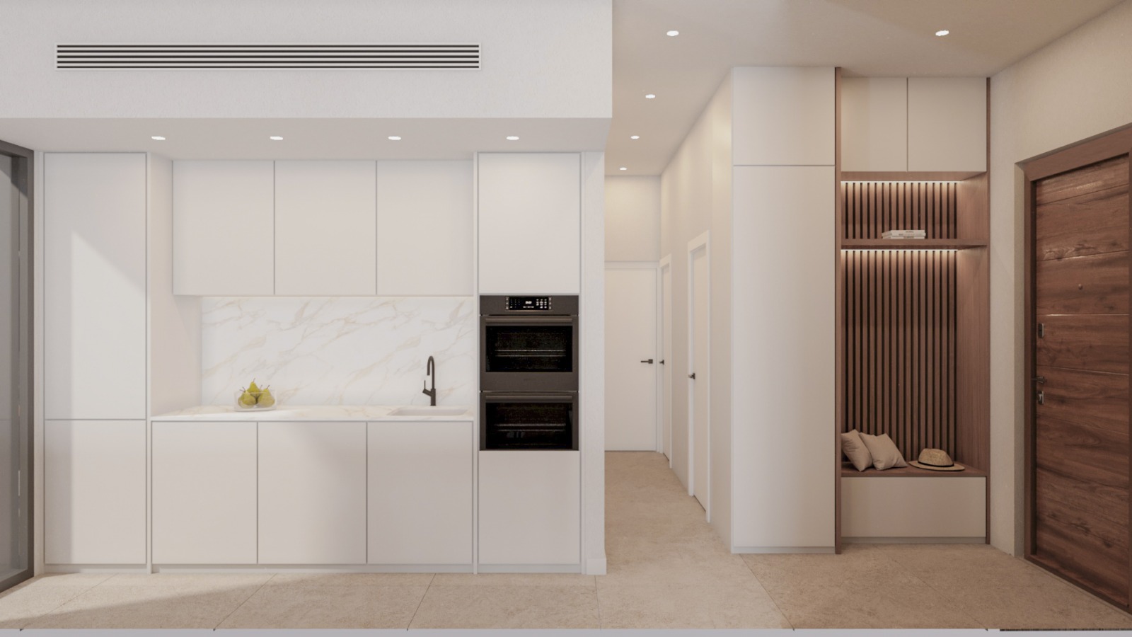 Cocina minimalista blanca con electrodomésticos integrados y encimera efecto mármol, junto a un recibidor con carpintería de madera y banco integrado.