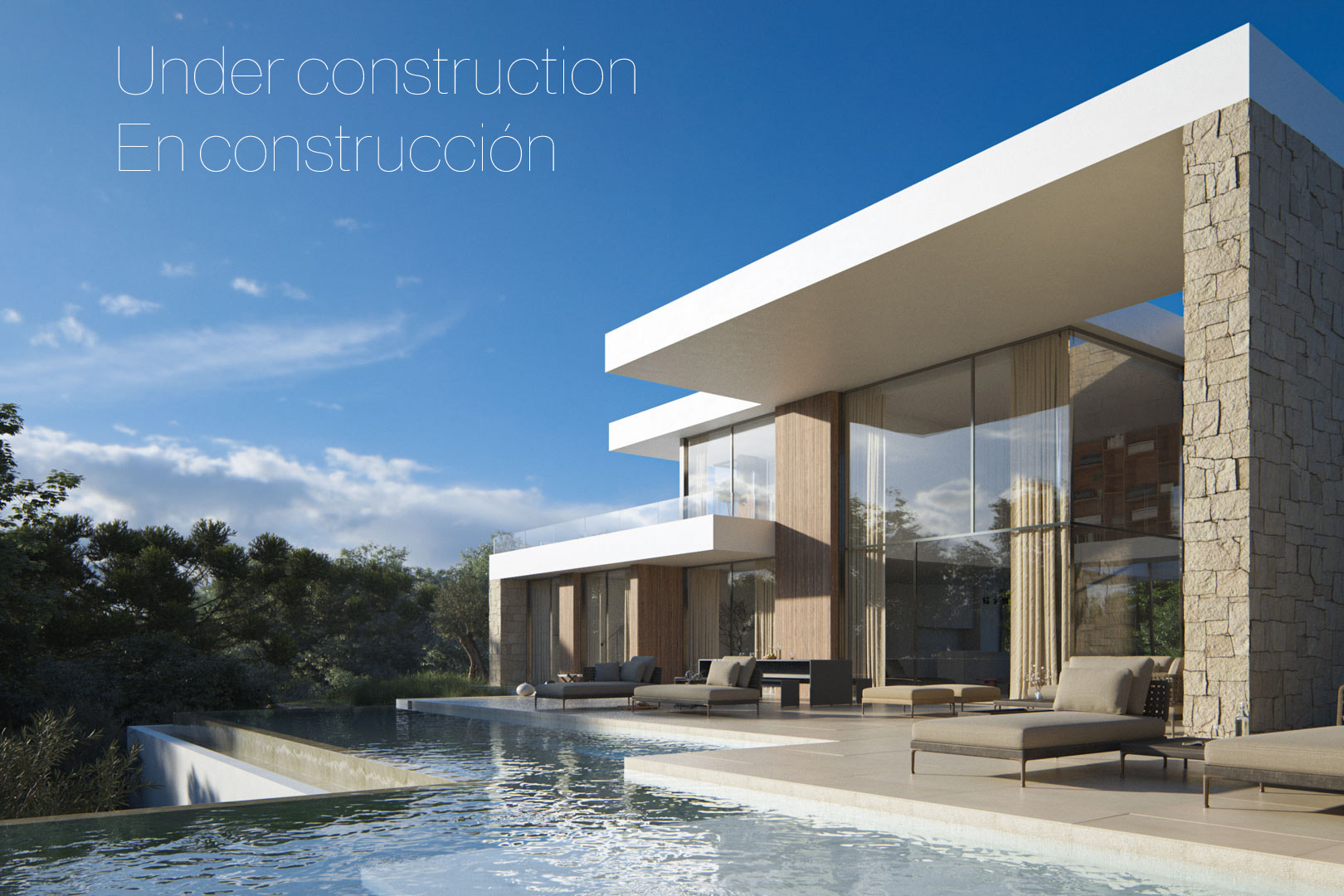 Fachada exterior de la villa con piscina infinita, amplios ventanales de doble altura y muros de piedra natural integrados en un diseño contemporáneo.