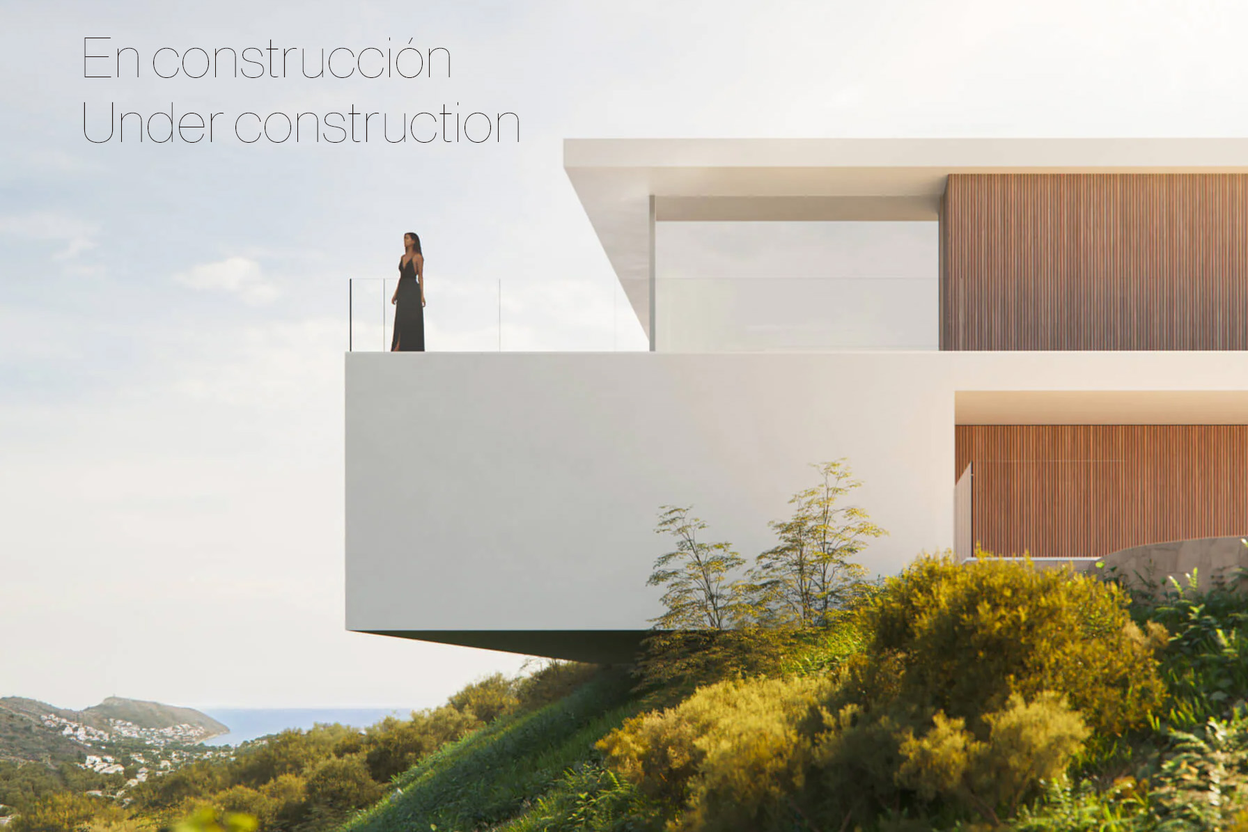 Fachada de diseño vanguardista con terraza voladiza, barandillas de cristal y revestimiento de madera, ofreciendo vistas panorámicas al mar y la costa.