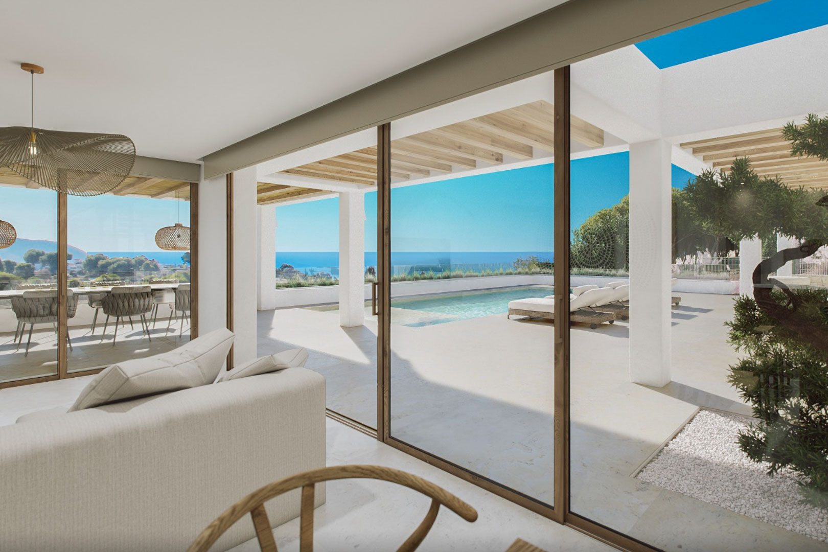Salón moderno con vistas a la piscina y al mar, con acceso directo a la terraza exterior.