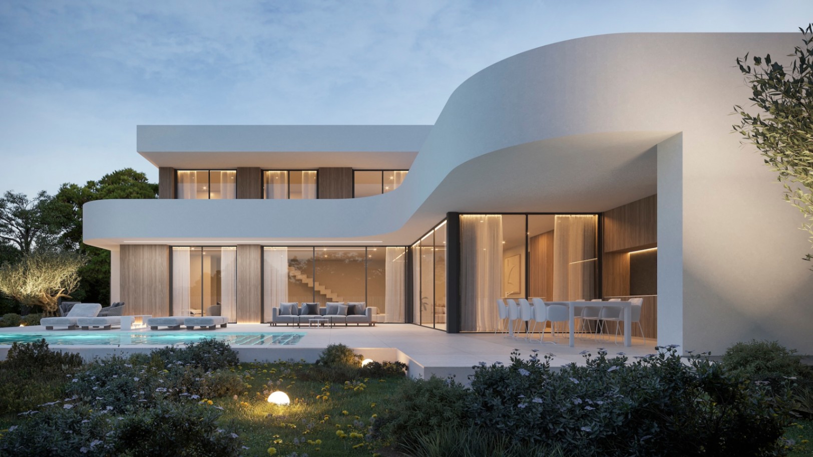 Vista exterior de la villa moderna con piscina, jardín florido y fachada blanca curva.