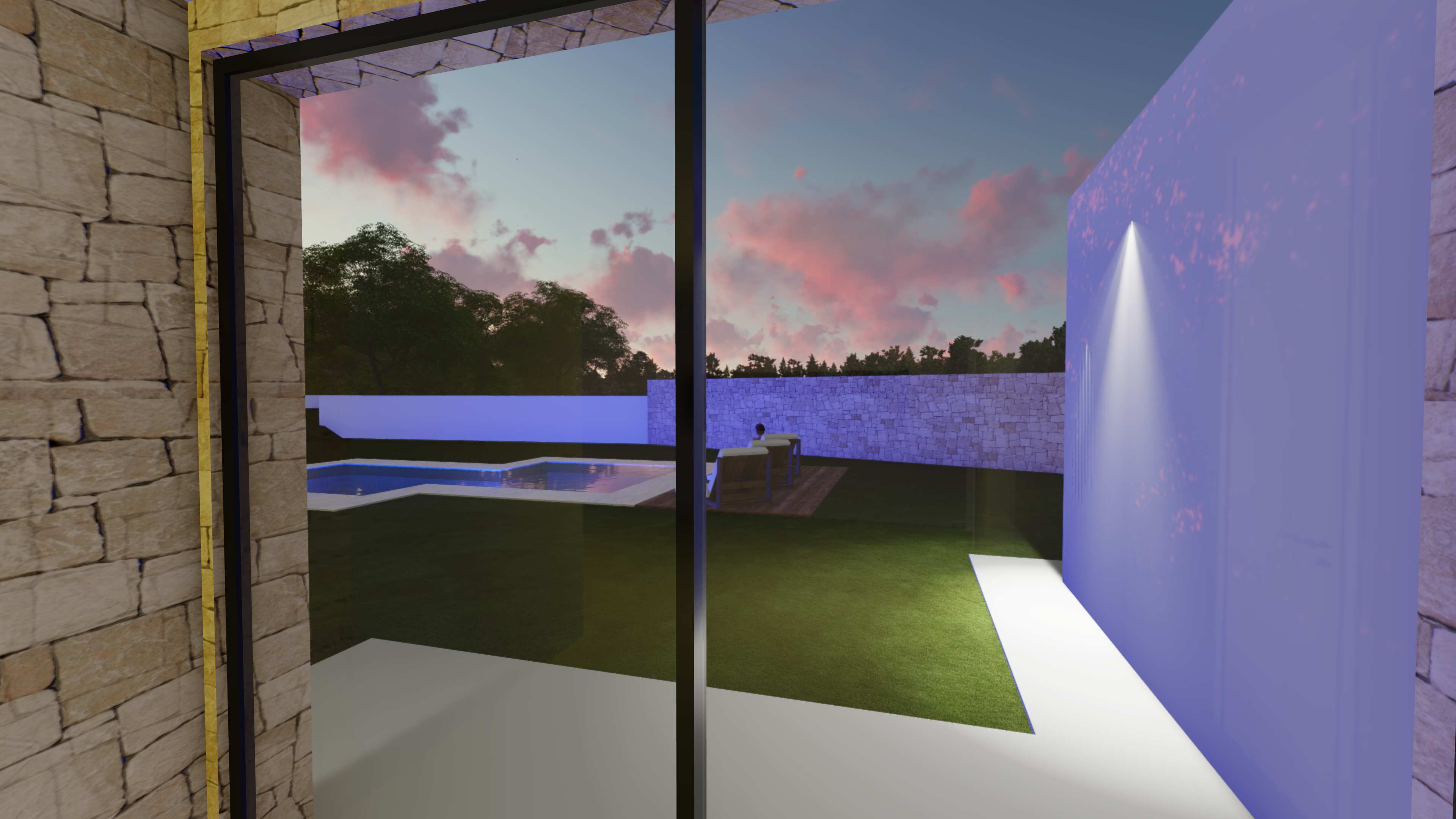 Vista desde el interior hacia el jardín con piscina, destacando los muros de piedra natural y la zona de descanso bajo un cielo de atardecer.