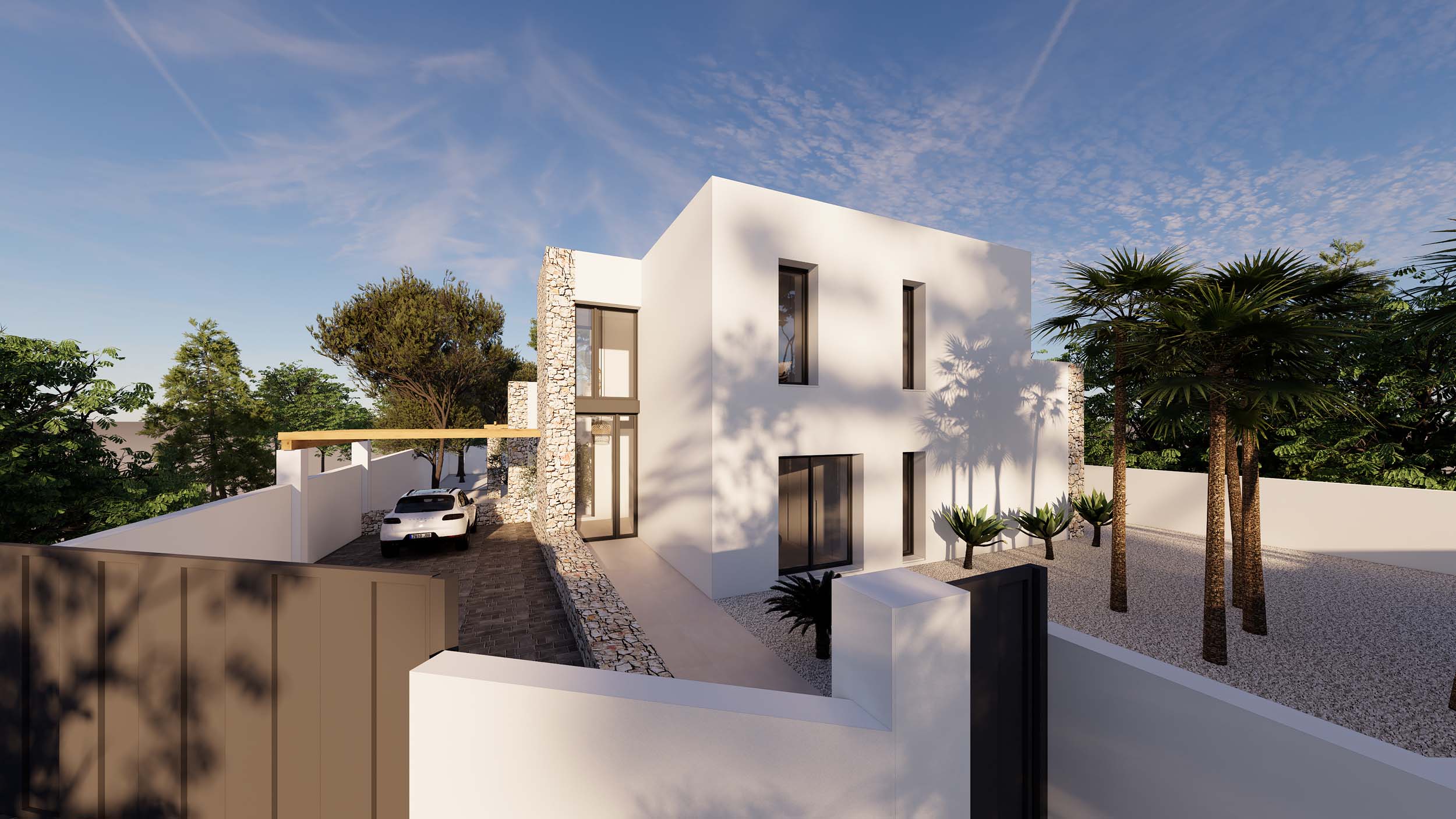 Fachada exterior de estilo ibicenco con muros de piedra natural, paredes blancas y jardín de grava con palmeras. Incluye entrada lateral y zona de aparcamiento con pérgola.
