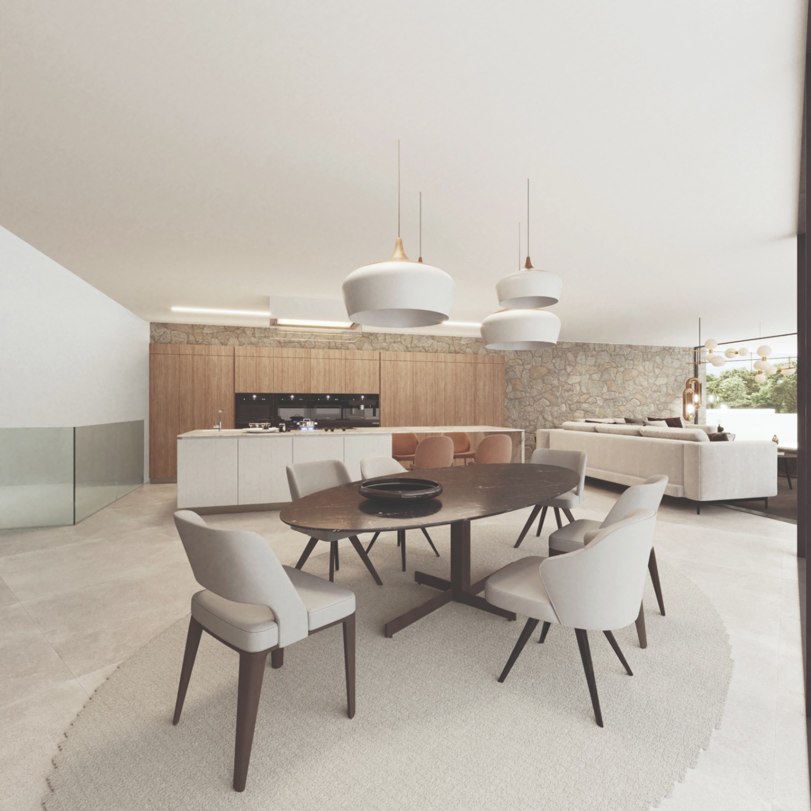 Zona de comedor y cocina de concepto abierto con mesa de mármol ovalada, armarios de madera natural y una pared de piedra seca que aporta calidez al diseño moderno.