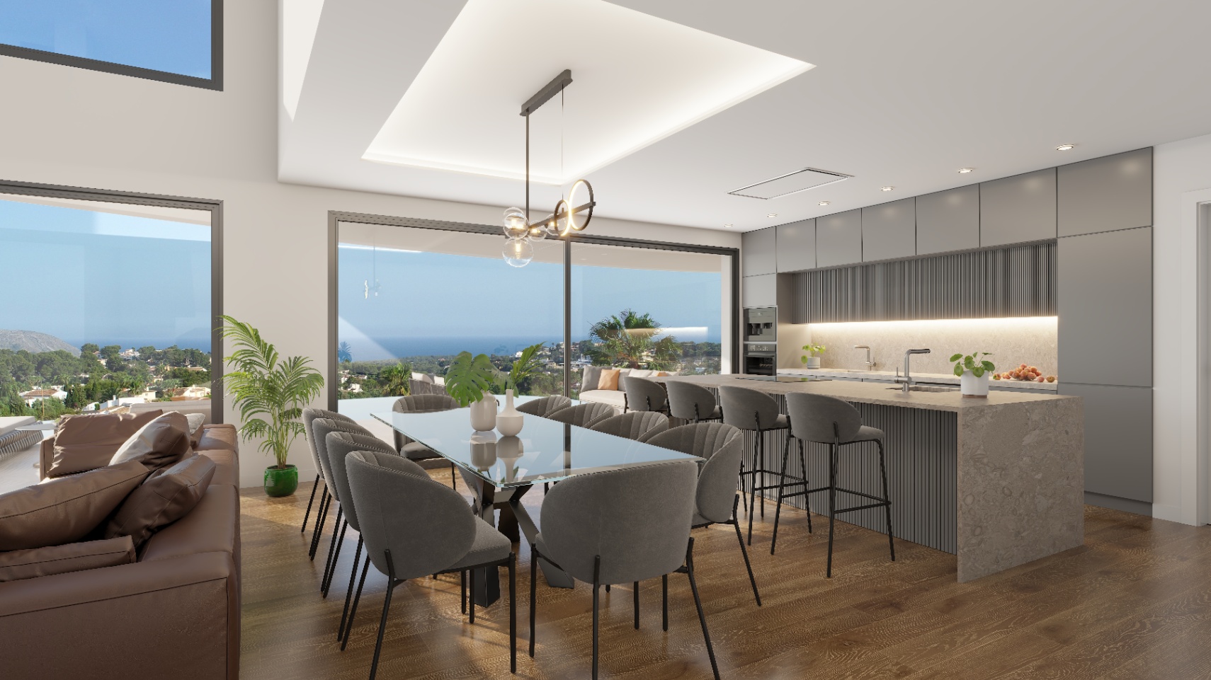 Zona de estar de concepto abierto con comedor y cocina moderna. Destacan los ventanales de suelo a techo con vistas al mar y una isla central con acabado en piedra.