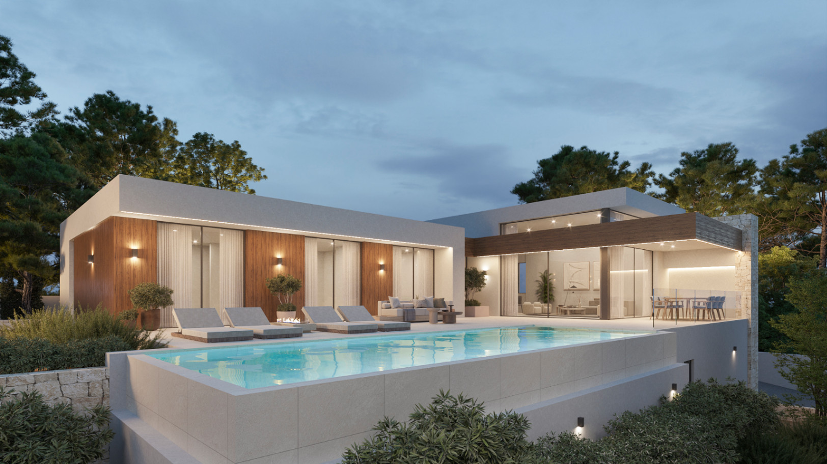 Vista exterior nocturna de la villa con piscina infinita, paneles de madera y amplios ventanales. La terraza incluye zona de hamacas y comedor exterior bajo iluminación integrada.