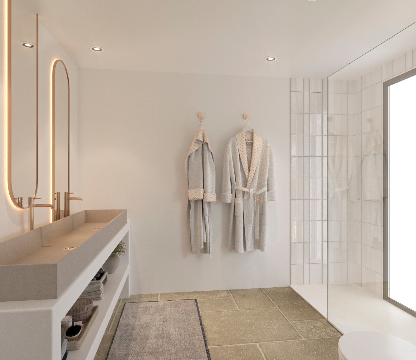 Baño moderno con lavabo doble de piedra, grifería dorada y espejos retroiluminados. Incluye ducha italiana con azulejos verticales y suelo de piedra natural.