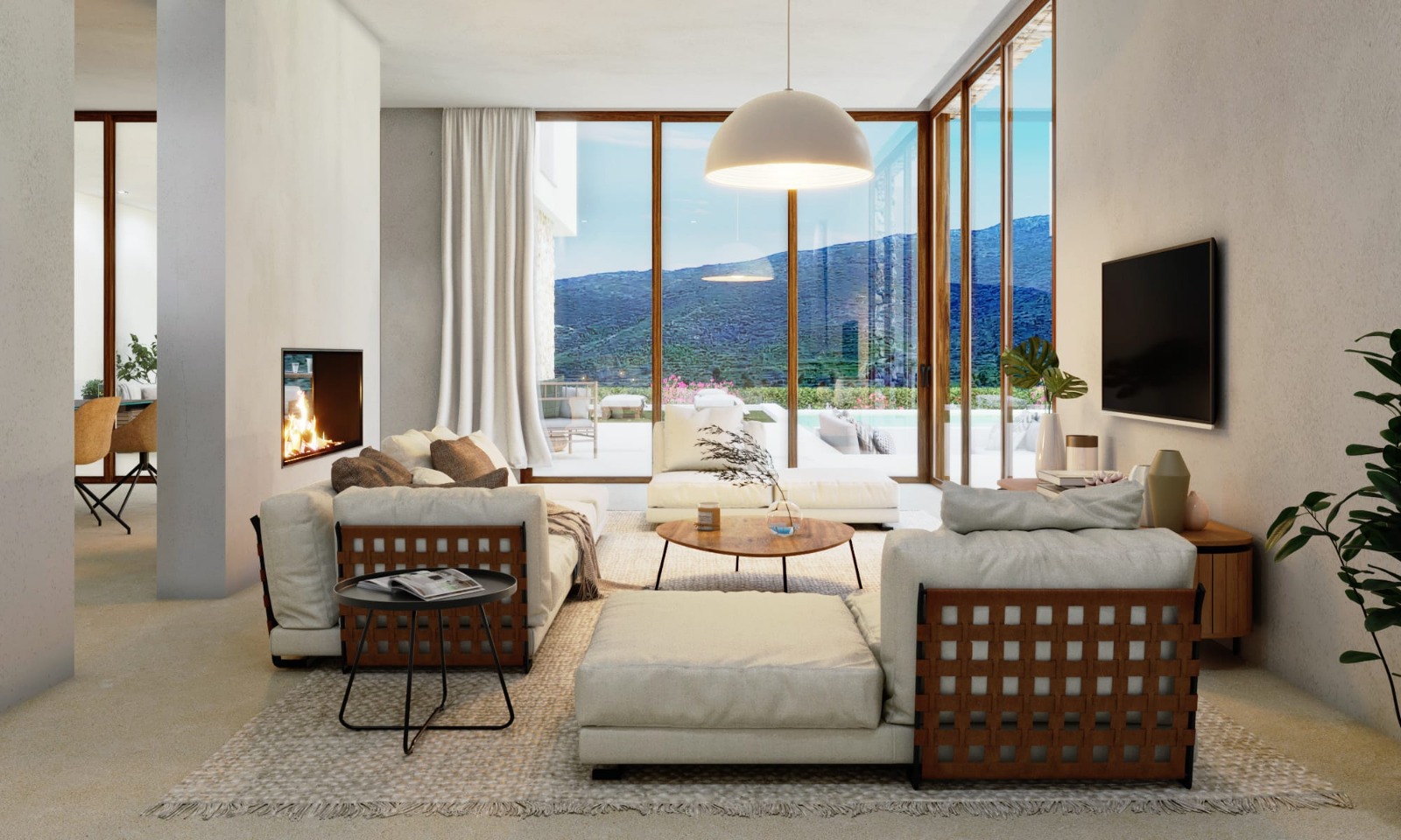Salón diáfano con chimenea integrada, sofás de diseño y amplios ventanales de madera que ofrecen vistas panorámicas a las montañas y acceso directo a la terraza.