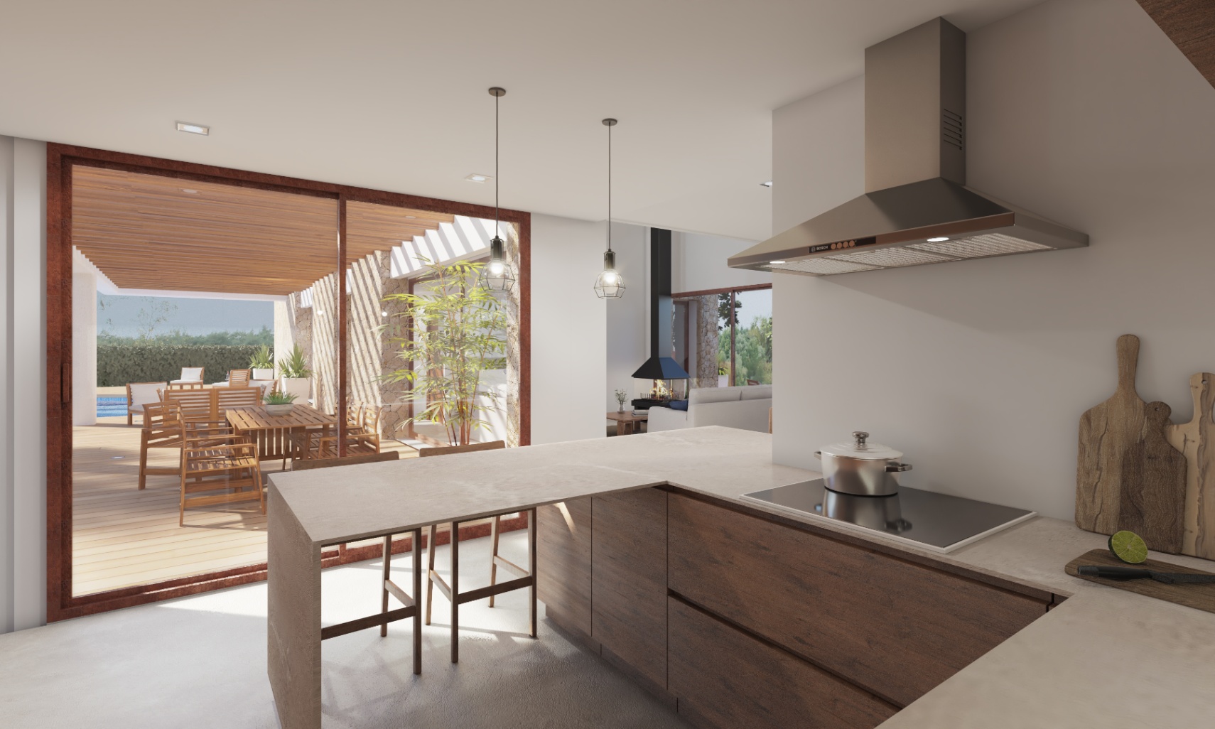 Vista de la cocina abierta con isla central y acceso a la terraza exterior con comedor y piscina.