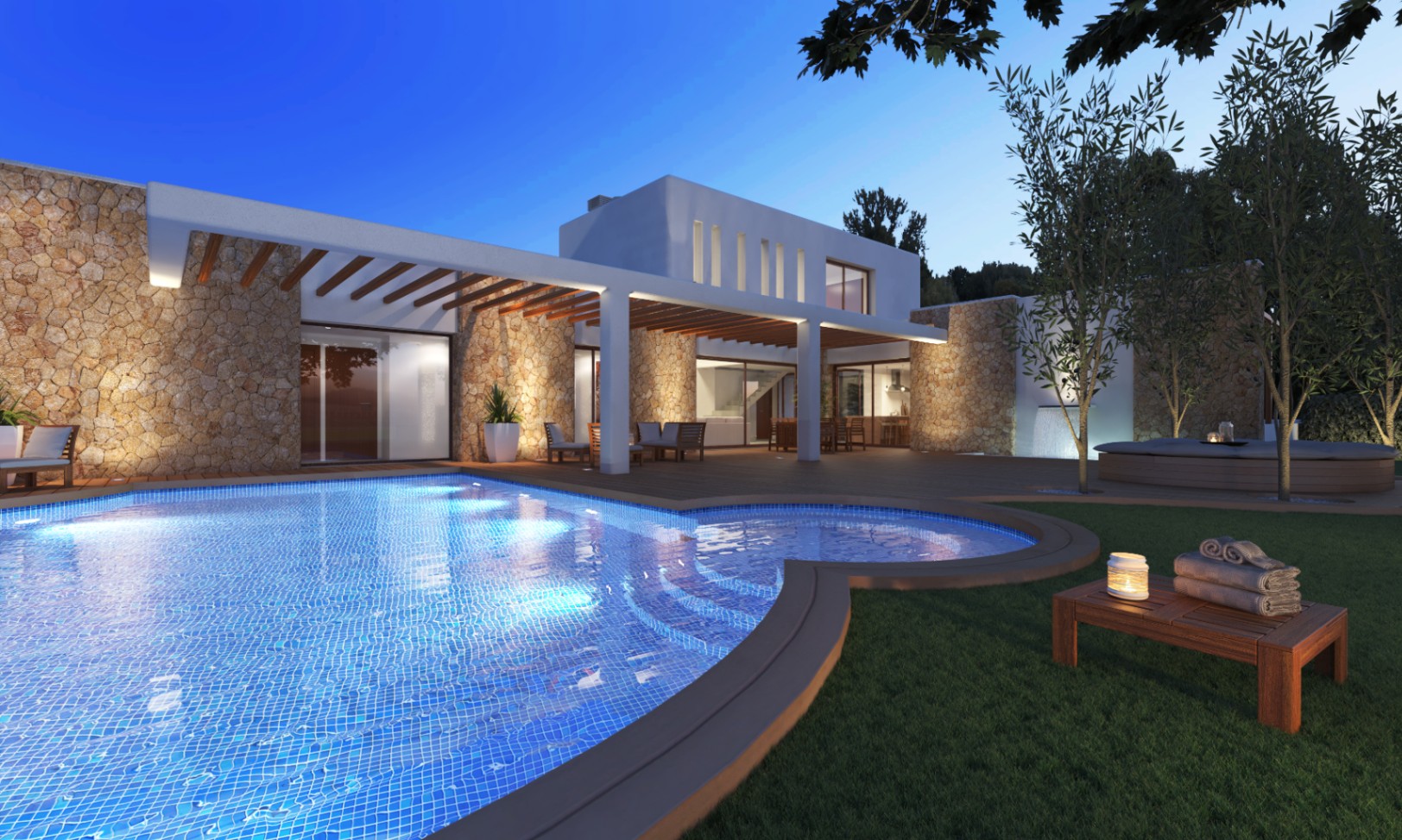 Vista nocturna de la piscina con mosaicos azules y fachada de piedra iluminada de la villa.