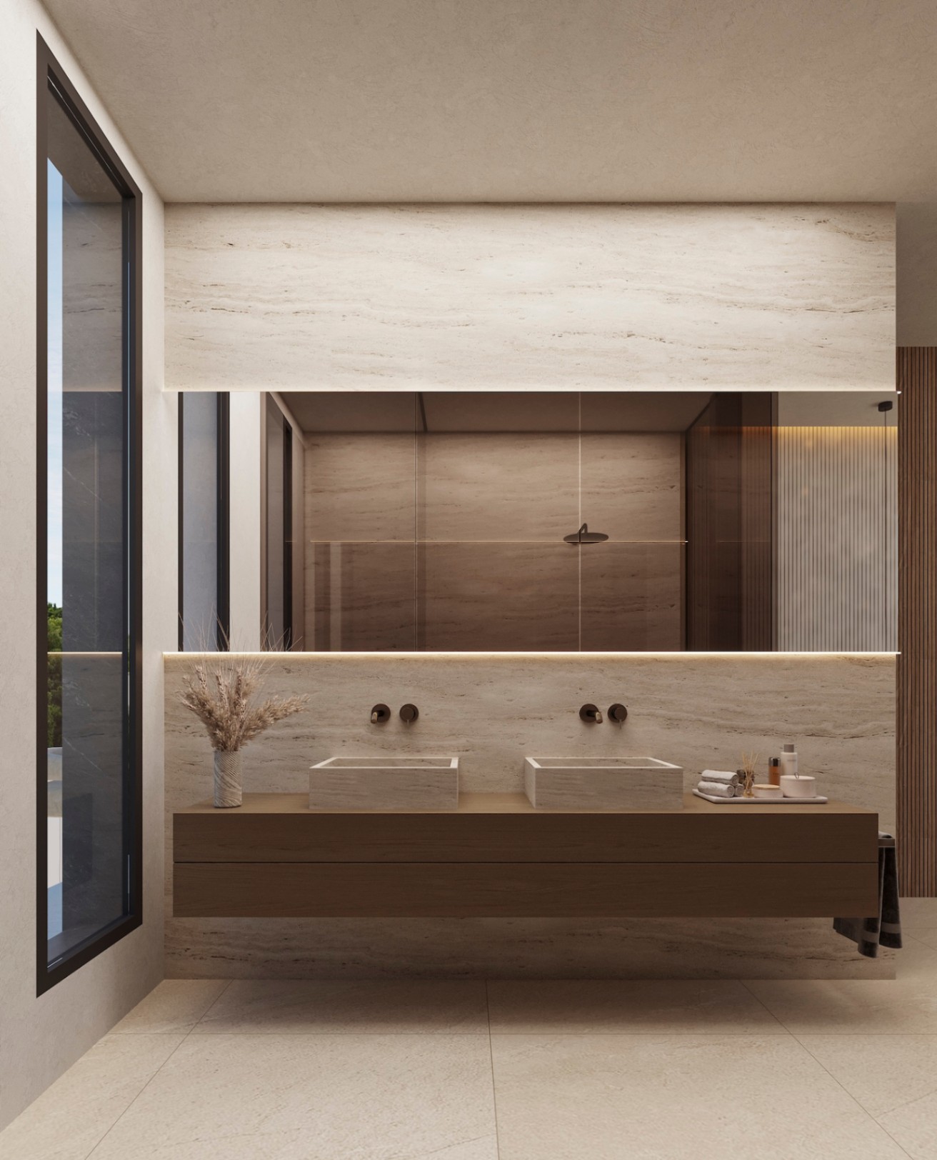Baño de diseño con lavabo doble de piedra sobre mueble suspendido de madera, grifería empotrada negra y espejo retroiluminado sobre paredes de travertino.