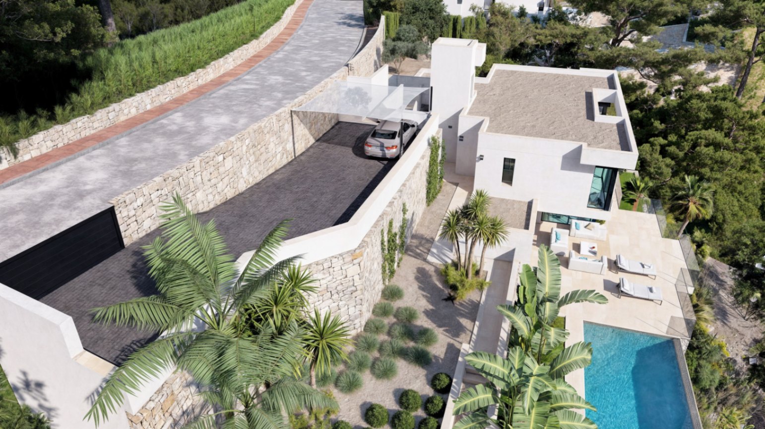 Vista aérea que muestra el acceso privado con muros de piedra natural, zona de aparcamiento con pérgola y la terraza principal con piscina infinity y jardín mediterráneo.