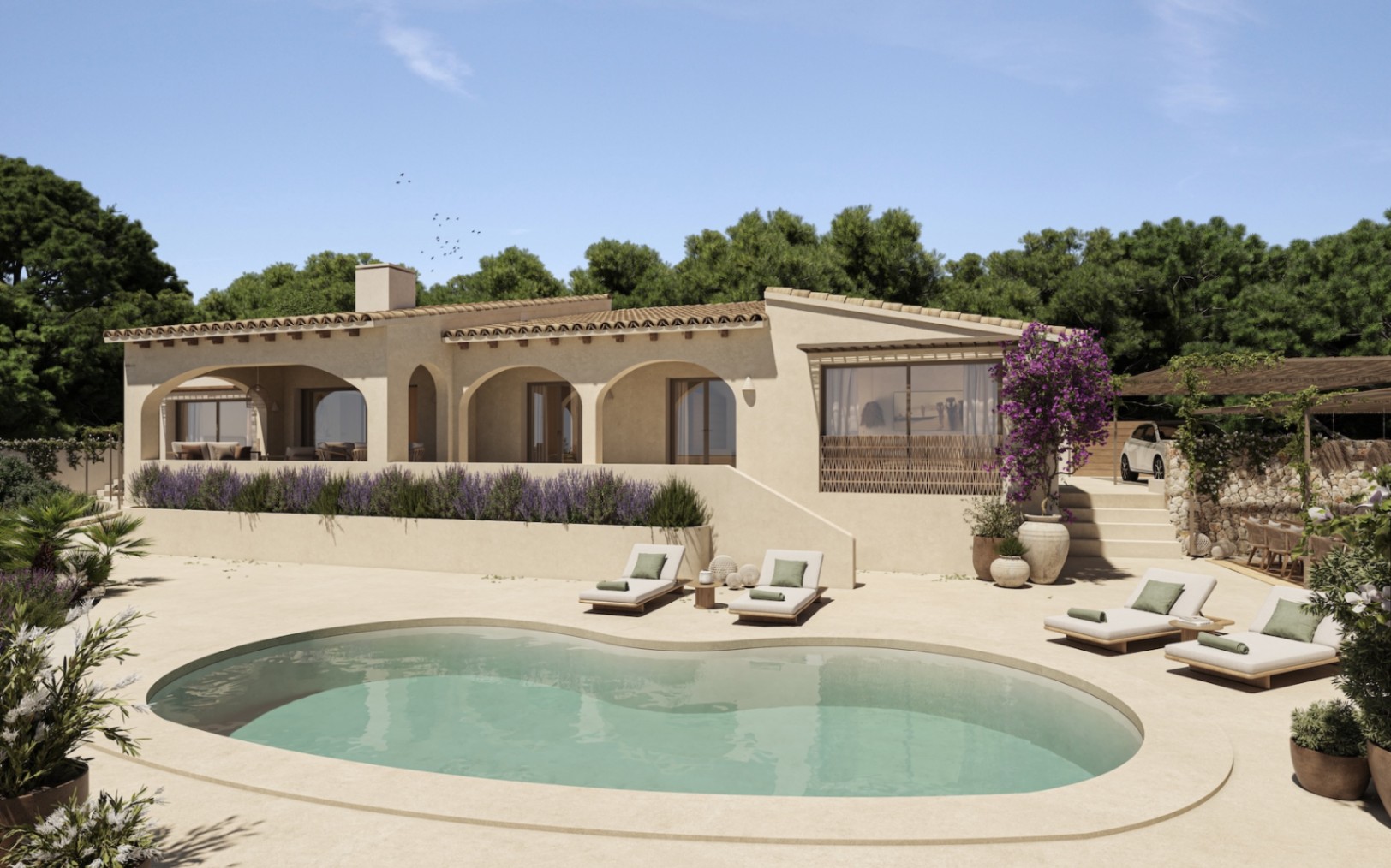 Vista exterior de la villa con piscina de diseño orgánico, porches de arcos mediterráneos y amplias terrazas rodeadas de lavanda y vegetación autóctona.