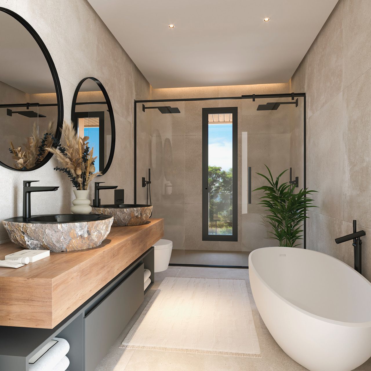 Baño principal con lavabos de piedra natural sobre encimera de madera, bañera exenta y ducha espaciosa con grifería negra y vistas al exterior.