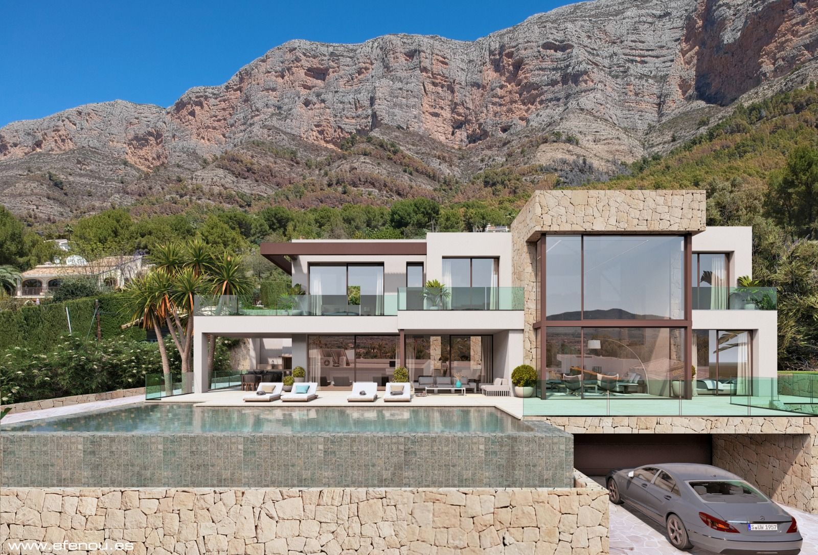 Vista exterior de la villa moderna con fachada de piedra natural y amplios ventanales, destacando la piscina infinita y las vistas al macizo del Montgó.