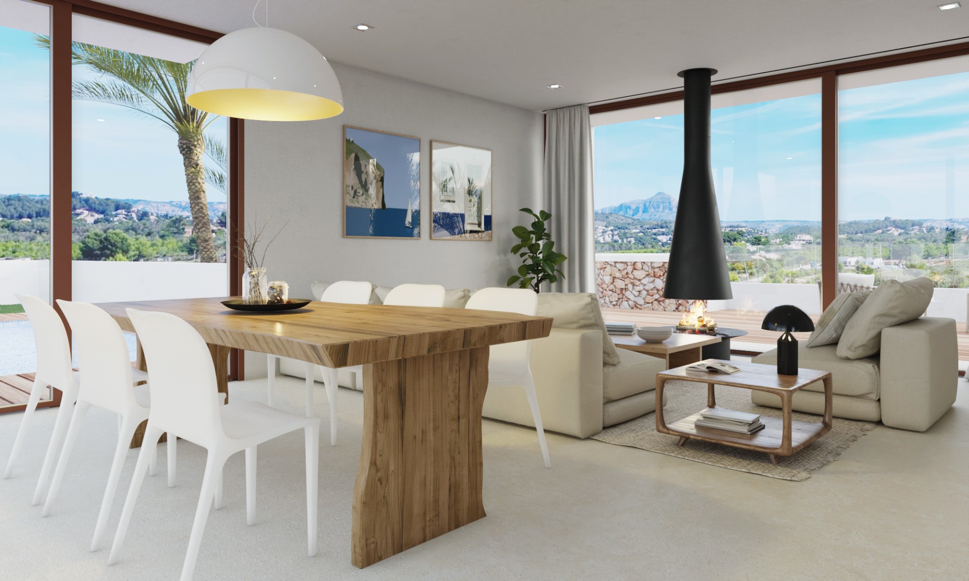 Salón-comedor diáfano con mesa de madera natural, chimenea suspendida de diseño y grandes ventanales con vistas panorámicas al Montgó y al entorno natural.