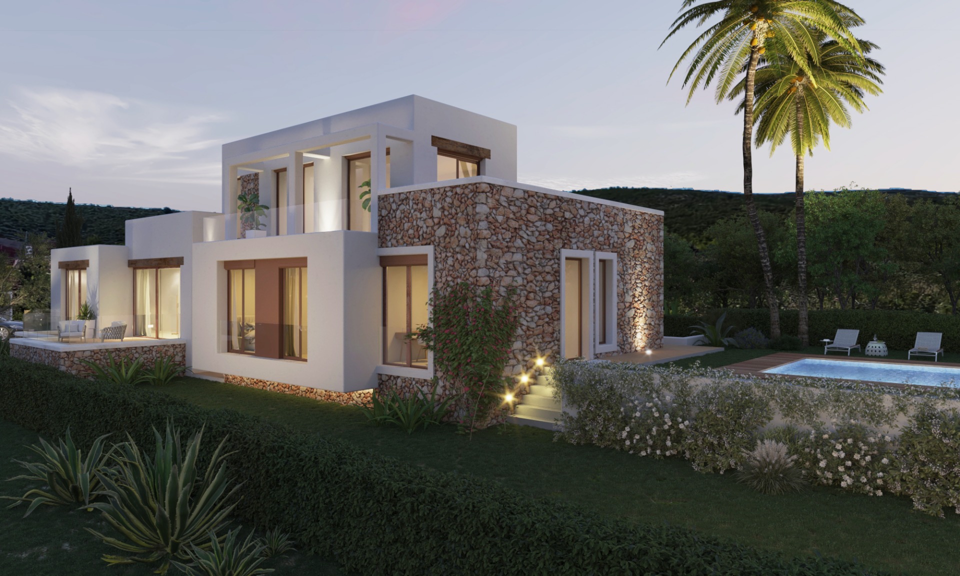 Vista exterior de una villa mediterránea moderna con muros de piedra natural, revoco blanco, iluminación en escaleras, piscina privada con tarima de madera y jardín paisajístico.