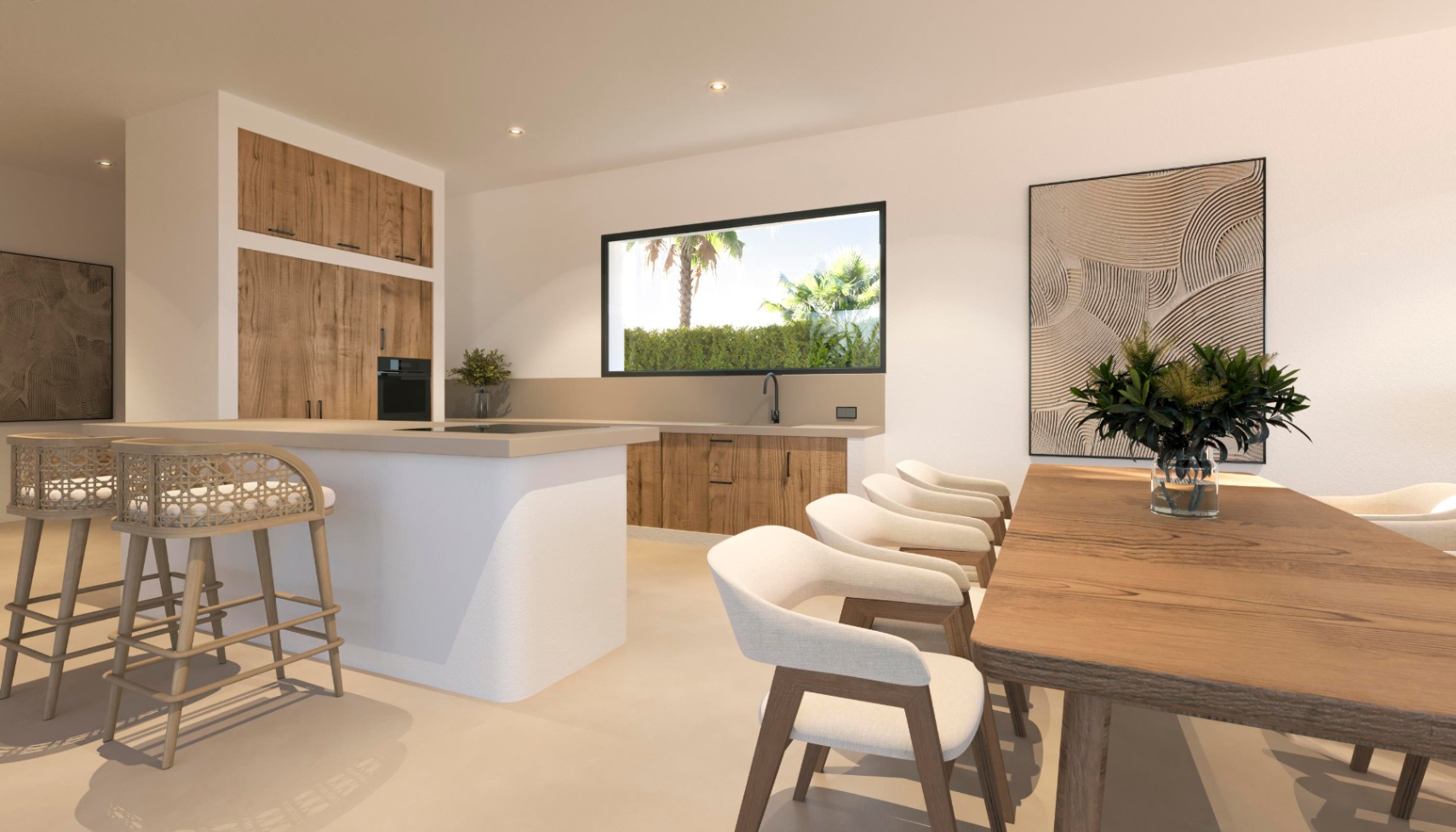 Cocina abierta con isla blanca, armarios de madera y zona de comedor con mesa de madera maciza, iluminada por luz natural y focos empotrados.