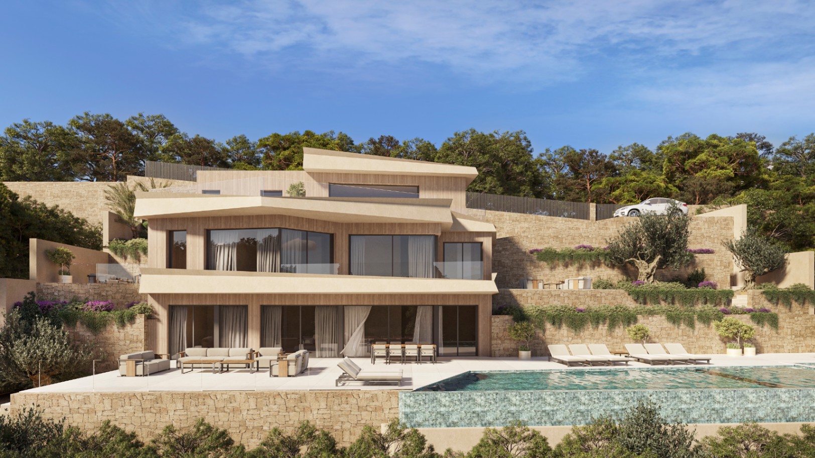 Vista exterior de la villa con fachada de madera y piedra, destacando la piscina infinita, amplias terrazas con mobiliario de diseño y jardines mediterráneos escalonados.