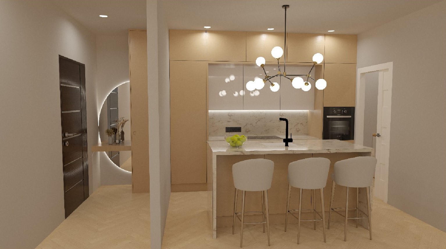 Cocina de concepto abierto con isla de efecto mármol, taburetes blancos y lámpara de diseño. Se aprecia la entrada con espejo circular retroiluminado y suelos de madera en espiga.